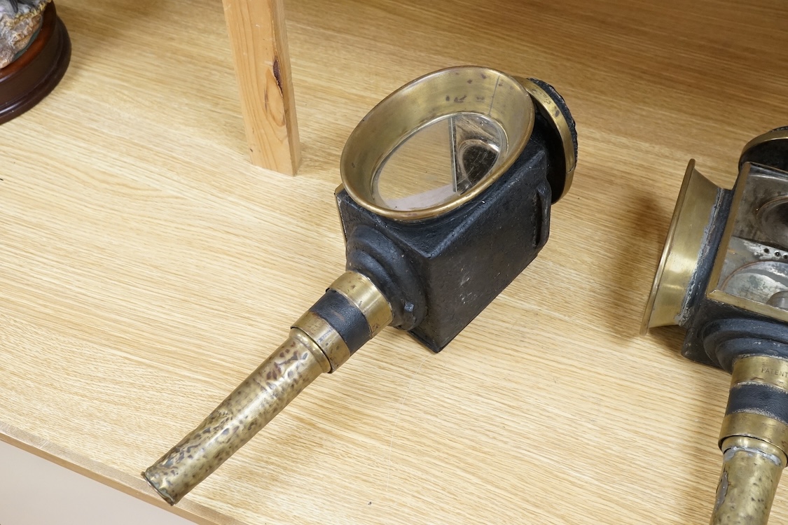 A pair of 19th century brass coaching lamps, 44cm high